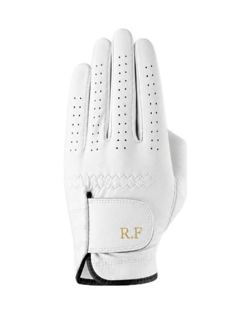The Monogram Glove in white cabretta, initials R.F in gold foil on the wrist strap.